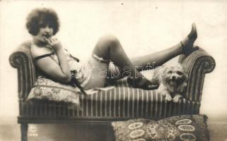Gently erotic postcard, lady with dog