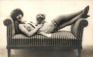 Gently erotic postcard, lady with dog