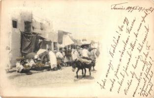 1899 Tunis, street view with merchants