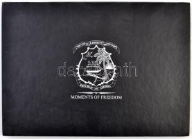 "Moments of Freedom - Republic of Liberia" érmetartó 24 férőhellyel kissé kopott, használt...