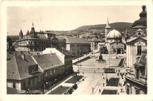 Pécs, Széchenyi tér, Kohn Hermann és Continental Pneumatik üzlete, villamos