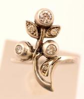 Ezüst(Ag) gyűrű, apró kövekkel díszítve, jelzett, méret: 56, nettó: 4,6 g