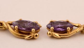 Arany(Au) 14K apró színtetikus kövekkel díszített függő, hozzáillő fülbevalópárral, jelzett, br: 4,6...