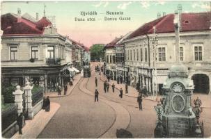 Újvidék, Novi Sad; Duna utca, villamos, üzletek, sírkőraktár, Ivkovic Milán üzlete és kiadása / street, tram, shops, tombstone warehouse (EK)