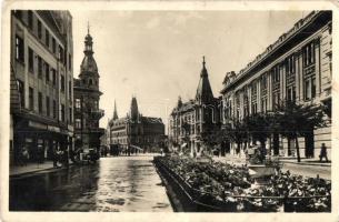 Kolozsvár, Cluj; Horthy Miklós tér, Uránia cukrászda, Izsák József üzlete, gyógyszertár, Motalko Benzin / square, shops, confectionery, pharmacy (EB)