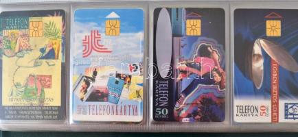 97 db telefonkártya különböző országokból, berakóban