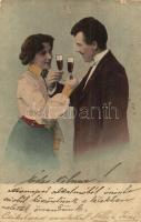 A couple toasting with champagne, romantic (tűnyomok / pinholes)