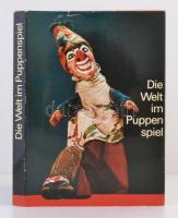 René Simmen: Die Welt im Puppenspiel. Zürich, 1972, Silva-Verlag. Kiadói egészvászon kötés, kiadói papír védőborítóban, gazdag képanyaggal, német nyelven./ Linenbinding, with paper cover, in german language.