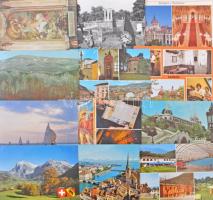 1 doboznyi főleg MODERN külföldi képeslap, városképes és motívumlapok, sok leporelló, több régi fotó / 1 box of mostly MODERN European and Worldwide postcards, townview and motive cards, many leporello booklets, some pre-1945 photos