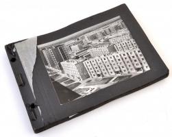 cca 1950 19 db fotó Sztálinvárosról, borító nélküli albumba rendezve, 9×12 cm