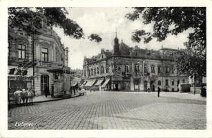 Losonc, Lucenec; Ruhagyár, Losonci Hitelbank, üzletek, Lichtig 19634. / clothing factory, bank, shops, 'Losonc visszatért' So. Stpl.