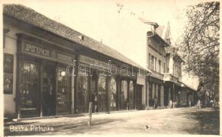 1941 Palánka, Backa Palanka; utcakép, gyógyszertár, B. Pavkov üzlete / street view with pharmacy and shops, photo