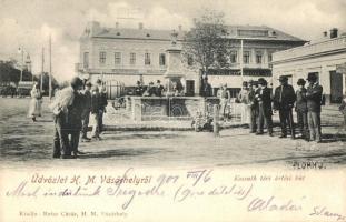 Hódmezővásárhely; Kossuth téri artézi kút, Keleti Adolf és Grossmann üzlete, Plohn J. fényképezte