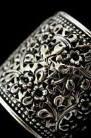 Ezüst(Ag) virágmintás áttört szalvétagyűrű, jelzett, d: 4,5 cm, h: 4 cm, nettó: 36,4 g