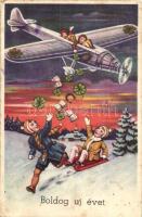 'Boldog új évet!' / New Year's greeting card, children on an airplane, clovers, horseshoe, money, sledge (Rb)