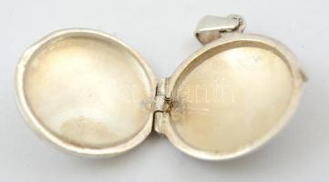 Ezüst(Ag) kerek képtartó medál, jelzett, 3,3x2,4 cm, nettó: 6,6 g