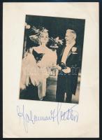 Johnnes Heester (1903-2011) operaénekes aláírása egy kartonlapon, őt ábrázoló újságkívágással, 18x13 cm. / autograph signature