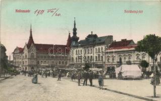 Kolozsvár, Cluj; Széchenyi tér, Vlad János üzlete, szesz és pálinka bolt, hentes, varrógép üzlet, piac, Lehota Anna kiadása / square, shops, alcohol store, butcher, sewing machine shop, market (EK)