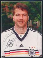 Lothar Matthäus (1961-) német világ- és Európa-bajnok, 150-szeres válogatott labdarúgó aláírása egy őt ábrázoló fotón, 15x11 cm./ autograph signature