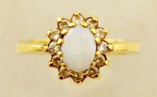 Arany (Au.) gyűrű kő berakással, 14K, jelzett, méret: 48, bruttó 3,2 g