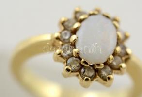 Arany (Au.) gyűrű kő berakással, 14K, jelzett, méret: 48, bruttó 3,2 g