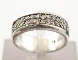 Ezüst(Ag) kövekkel kirakott gyűrű, jelzett, méret: 51, bruttó: 6,1 g