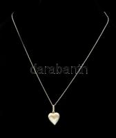 Ezüst(Ag) szív alakú medál, ezüst(Ag) láncon, jelzett, medál: 1,5x1,5 cm, h. 36 cm, nettó: 2,6 g