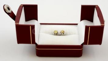 Gyémánt fülbevaló pár 14 K fehérarany foglalatban. Br 1,73 g , Gyémántok összesen 0,45 Ct. Díszdoboz...