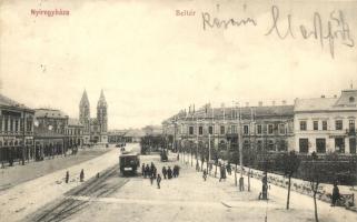 Nyíregyháza, Beltér, villamos, Schvarcz József és Bodnár Pál üzlete. Levelezőlap Király kiadása