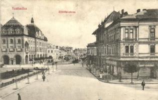 Szabadka, Subotica; Eötvös utca, Taussig Vilmos, Löwy üzletei, városháza, Heumann Mór kiadása / street, town hall, shops (fa)