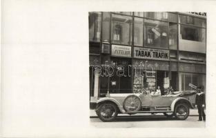 Vienna, Wien; Zu Vermiten Atelier, Kais. und. König. Tabak Trafik / street view with tobacco shop, automobile, mariner, photo