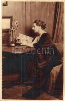Marie of Romania reading a book