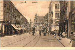 Linz a. D., Landstrasse, Kleider Magazin / street view with tram, shops