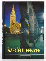 Dusha Béla: Szegedi fények. Szeged, 2002, Winter Fair. Csökkentett terjedelmű, átdolgozott kiadás. Kiadói kartonált papírkötés. Jó állapotban.