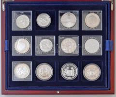 Vegyes 24db-os olimpiai témájú forgalmi ezüst emlékpénz gyűjtemény fa díszdobozban, 17klf ország érm...