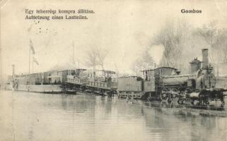 Gombos, Bogojeva; egy (3087) teherrész kompra állítása. Tippl Józsefné kiadása / Aufsetzung eines Lastteiles / ferry, freight train (fa)