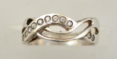 Ezüst(Ag) 11 szintetikus kővel díszített gyűrű, jelzett, méret: 58, bruttó: 3,6 g