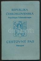 1934-1936 Csehszlovák útlevél, fényképpel, csehszlovák és magyar okmánybélyegekkel, számos bejegyzéssel, köztük a pozsonyi magyar konzulátus bejegyzéseivel, egészvászon-kötésben, kissé viseltes kötéssel./ 1934-1936 Czechoslovakian passport, with photo, with Czechoslovakian and Hungarian documentary stamps.