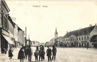 Torda, Turda; Fő tér, üzletek, Fodor Domokos könyvnyomdája, Füssy József kiadása / main square, shops, printing house (EK)