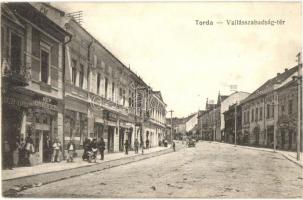 Torda, Turda; Vallásszabadság tér, Lunzer Károly bádogos üzlete, Nép könyvkereskedés és saját kiadása / square, shops