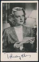cca 1942 Tolnay Klári (1914-1998) színésznő aláírása az őt ábrázoló fotólapon, 14x9 cm.