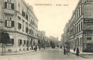 Szombathely, Király utca, villamos, Weinberg divatáruház, Fischer Lajos szűcsáru raktár, Hoffmann cipőkereskedés, Özv. Schöntag bútorszállító reklámjai a házfalon, Özv. Fekete Istvánné kiadása (EK)