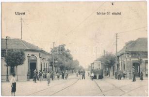 Budapest IV. Újpest, István út, villamos a megállóban, Gyógyszertár a Magyar Koronához, Schuster cukrászda, csendőr (Rb)