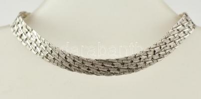 Ezüst(Ag) lapos fonott karkötő, jelzett, h: 20,5 cm, nettó: 9,5 g