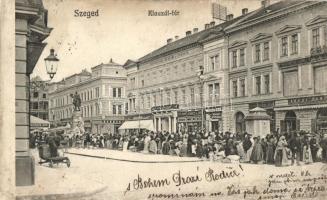 Szeged, Klauzál tér, gyógyszertár, piac, Kereskedelmi és iparbank, Lesinger Mór, Schwarcz és társa, Árvay Sándor, Bruckner Dezső és Seifmann Mór üzlete. Kiadja Traub B. és társa (EK)