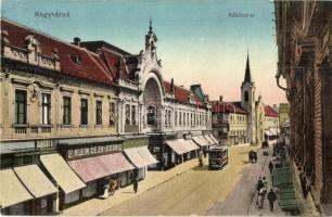 Nagyvárad, Oradea; Rákóczi út, Klein Géza és Ödön, Barabás B. és társa, Grünvald Herman, Újhelyi Róza és Petrovics Mihály üzlete, villamos / street view with shops and tram (EB)