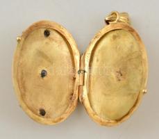 Arany(Au) 14 K képtartós kinyitható medál rubinnal, jelzett, 3x2,5 cm, bruttó: 5 g