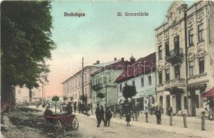 Drohobych, Drohobycz; Ul. Grunwaldzka / street view, J. Steif's shop, hairdresser, restaurant, Leopold Rosencshein (EK)