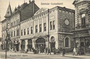 Szabadka, Subotica; Kossuth utca, gyógyszertár, Arany Bárány szálloda, Turul cipőgyár üzlete / street view with hotel, shops, pharmacy