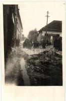 1930 Eperjes, Presov; utcakép a nagy jégeső után katonákkal, A. Petrova üzlete / street view after the hail, soldiers, shop. photo